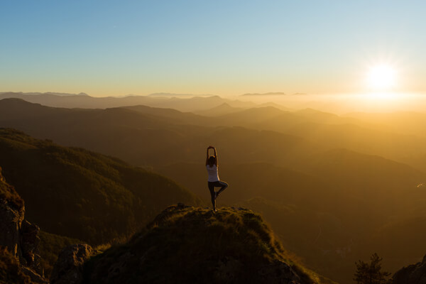What is the difference between jnana and karma yoga?
